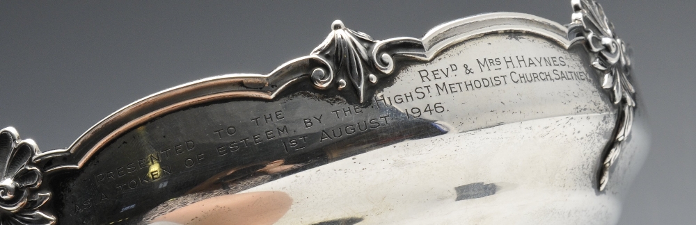 A 1930's silver pedestal dish of circular form, applied foliate, shell and scroll rim with a later - Image 2 of 7