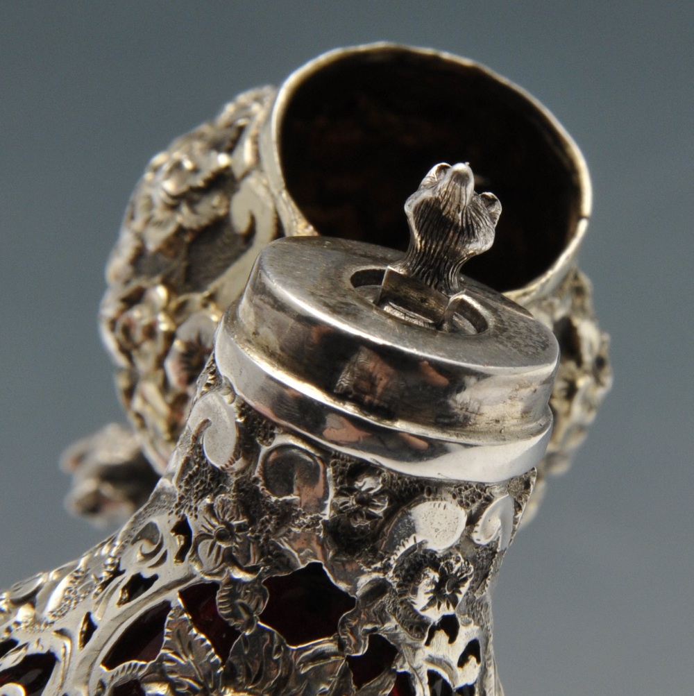 A French scent bottle, the cranberry glass body of tapered form and overlaid with scroll open-work - Image 5 of 6