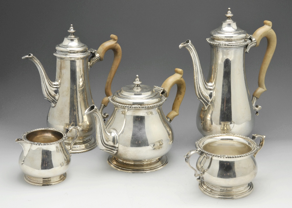 A 1960's silver tea service, comprising teapot, coffee pot, cream jug and twin-handled sugar bowl,
