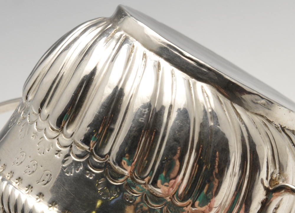 A Queen Anne small silver porringer, of typical form with oblique fluted lower body rising to an - Image 4 of 5