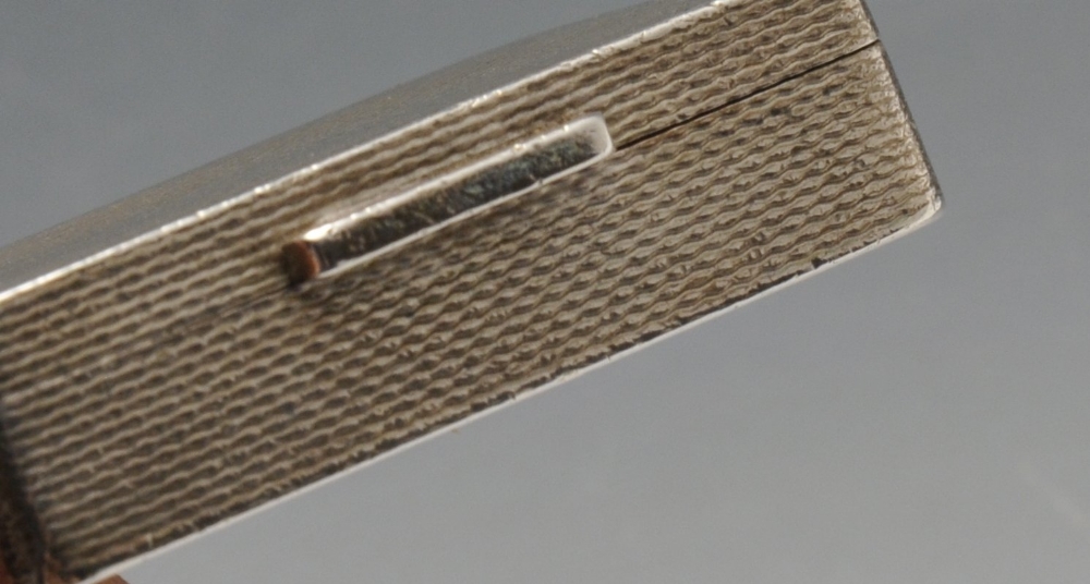 A 1960's silver small snuff or pill box, of plain rectangular form having engine-turned exterior - Image 5 of 6