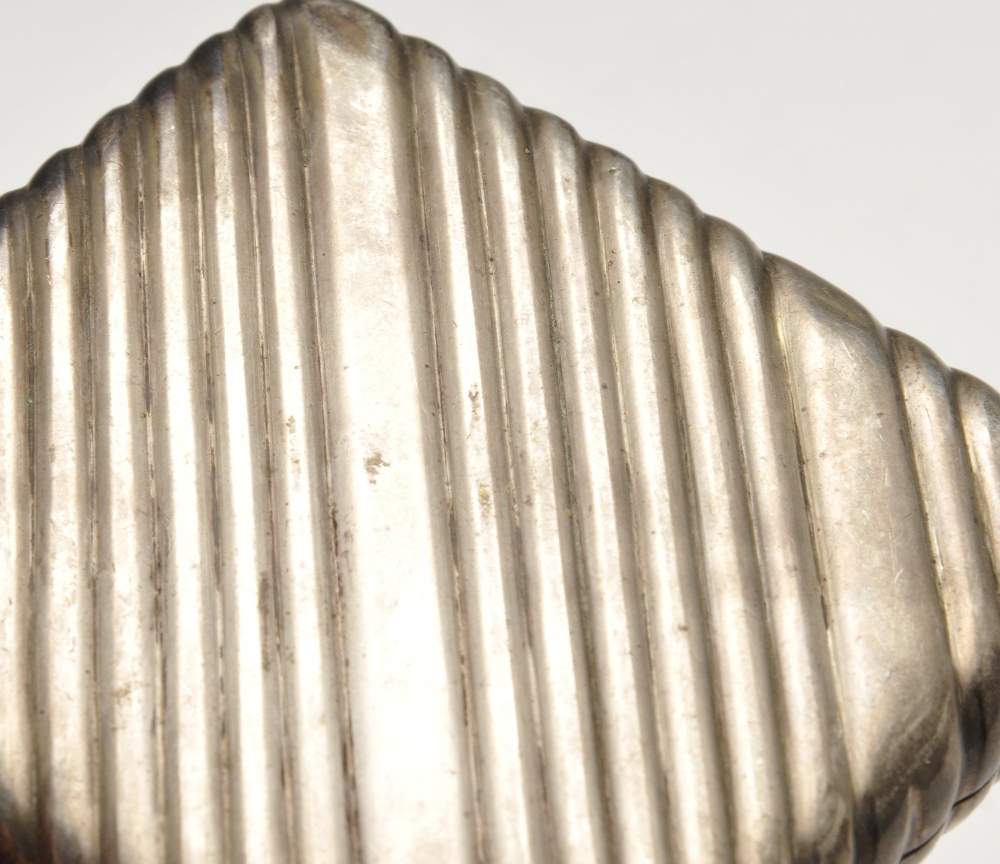 A Continental silver cigarette case having diagonally reeded exterior, marked MS beside further - Image 6 of 9