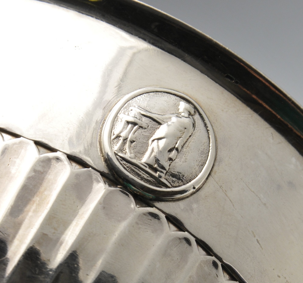 A late George III silver bowl of circular form, crest engraved and decorated with four raised oval - Image 4 of 6