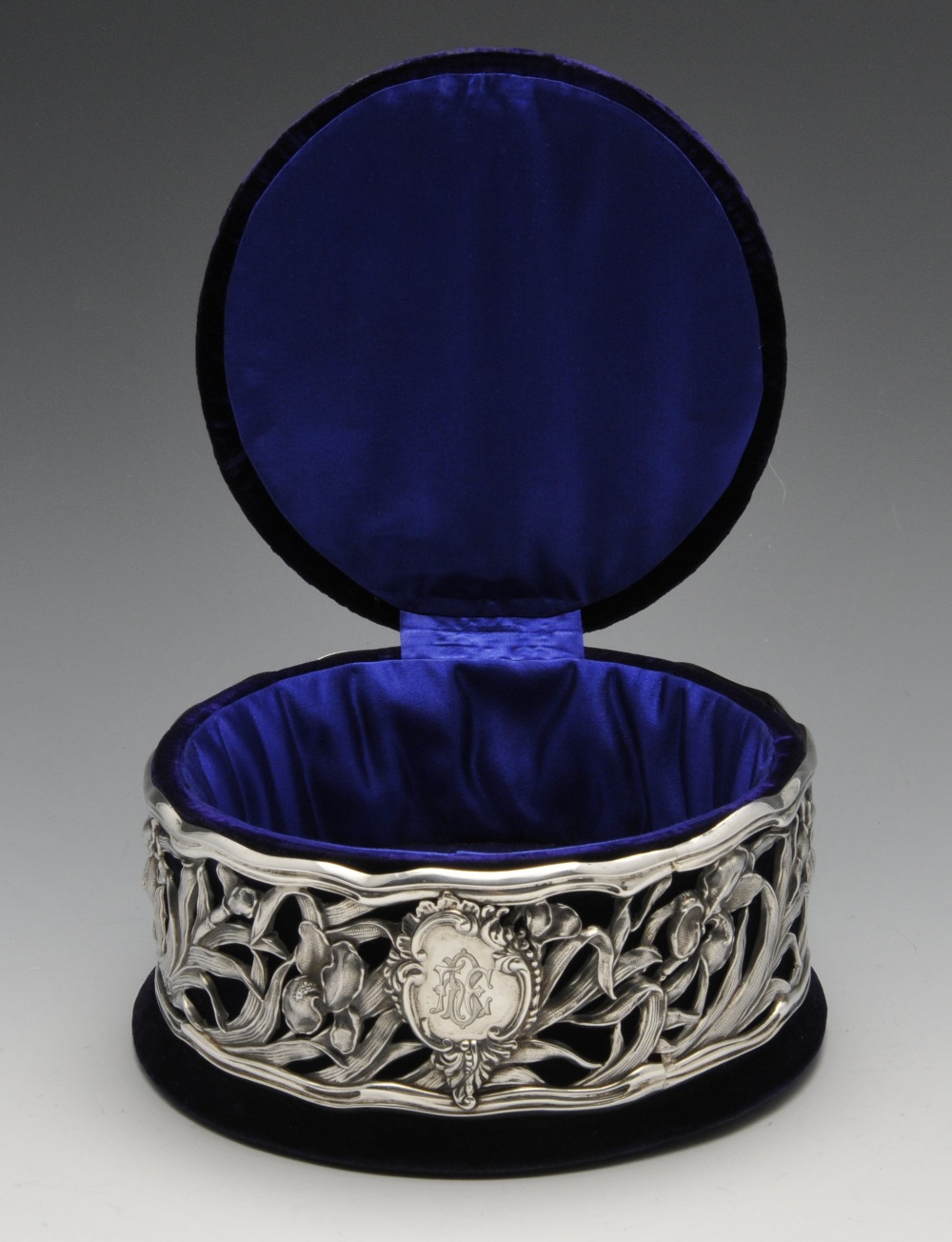 An Edwardian Art Nouveau silver mounted jewellery box, the circular velvet covered box with domed - Image 2 of 6