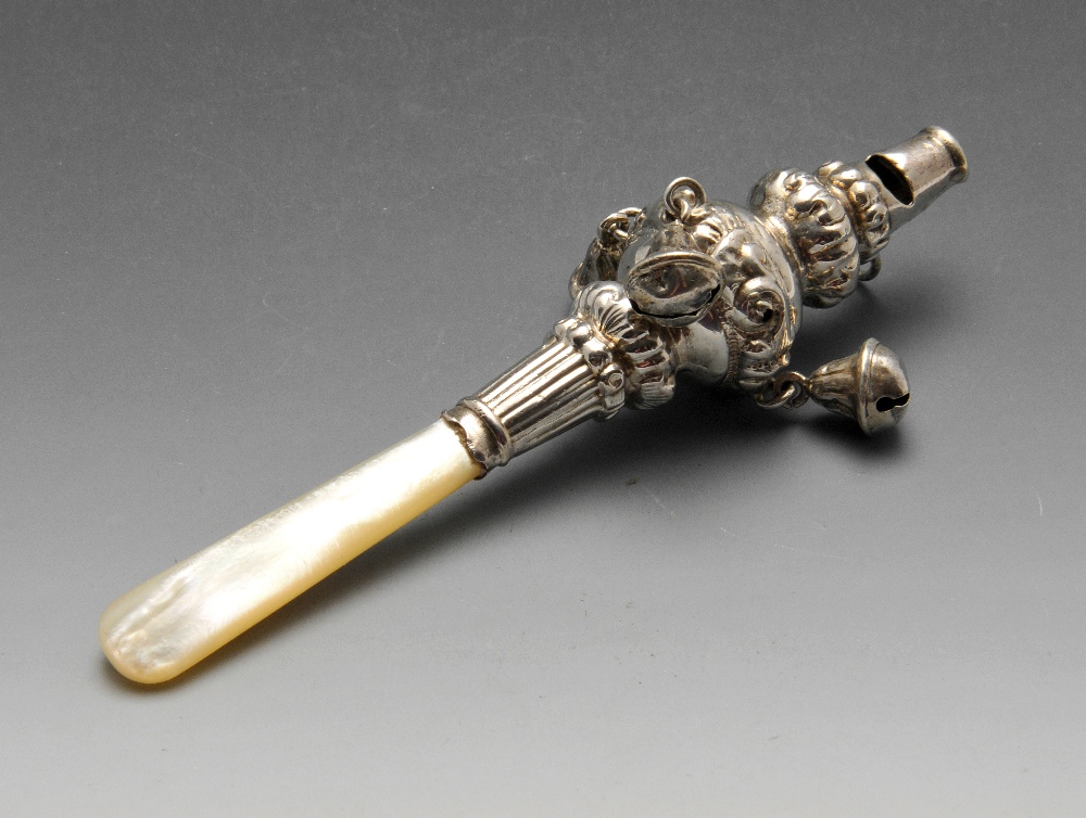 An Edwardian silver mounted rattle, of baluster form with whistle, bell suspensions and mother-of-