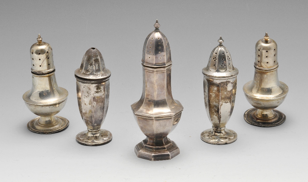 A selection of seven Edwardian and later silver casters of various styles and to include two