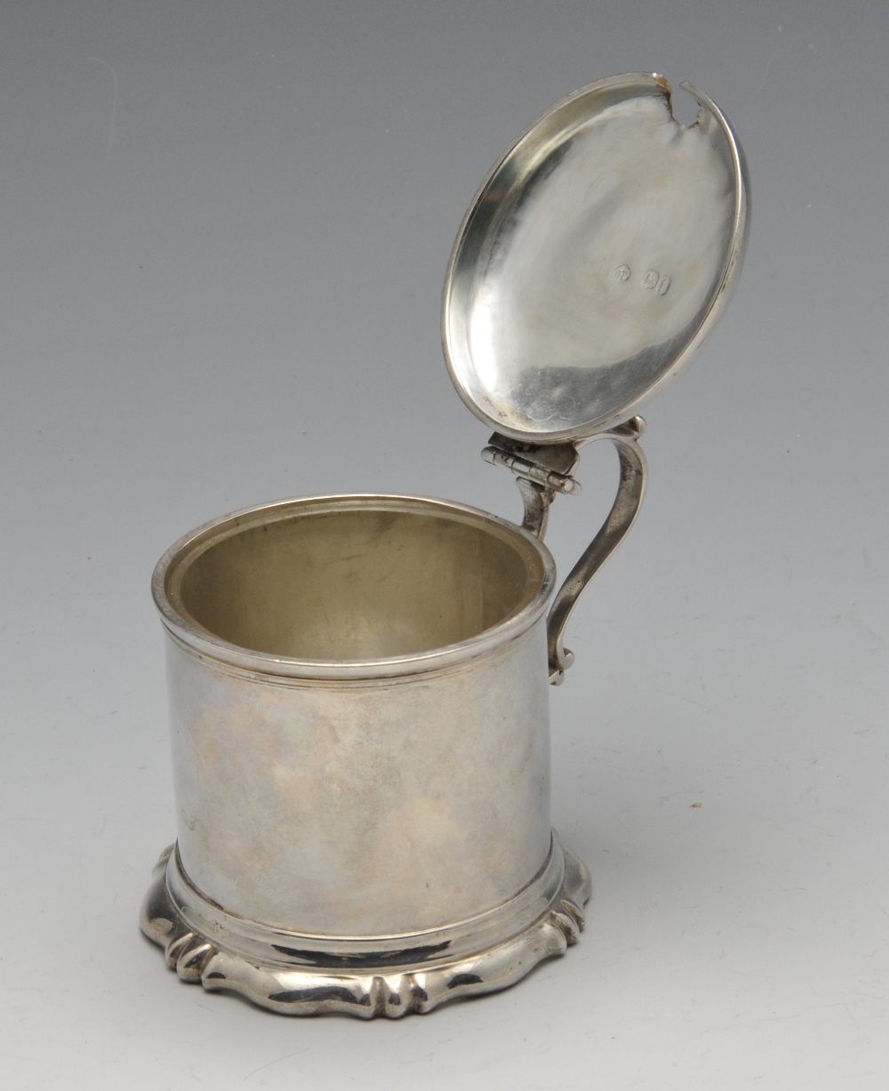 A Victorian silver mustard pot, the plain cylindrical form on fluted spread foot rising to the domed - Image 2 of 4