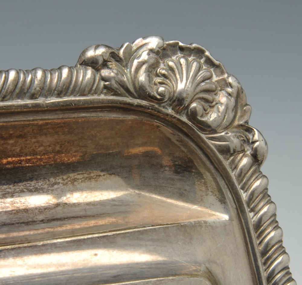 A George III silver desk stand of oblong form, having a gadroon rim with foliate shell borders and - Image 7 of 9