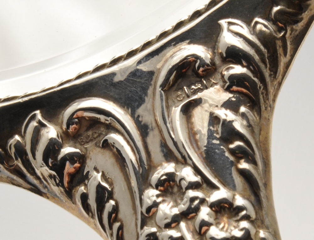 A 1970's silver mounted part dressing set having embossed cherub decoration within floral scrolls, - Image 2 of 8