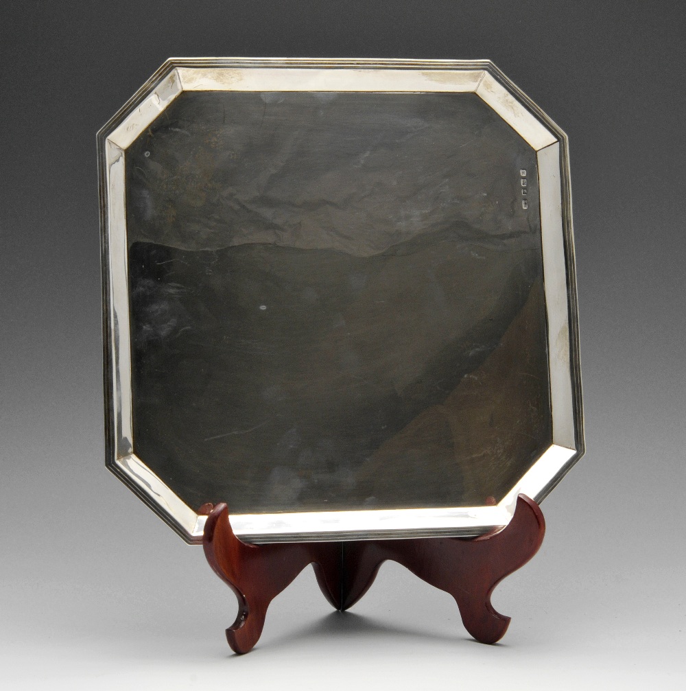 A 1930's silver salver of plain square form with canted corners. Hallmarked Viner's Ltd,