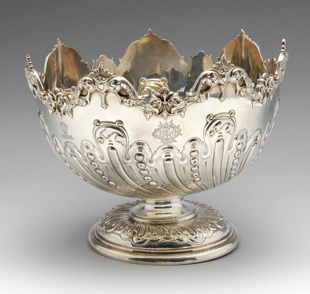 A late Victorian silver rose bowl, the circular form with wrythen fluted body interspersed with