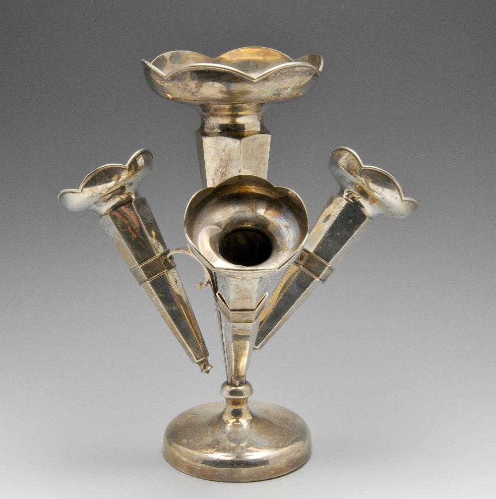 An early twentieth century silver epergne, the central vase with hexagonal sided tapering stem and