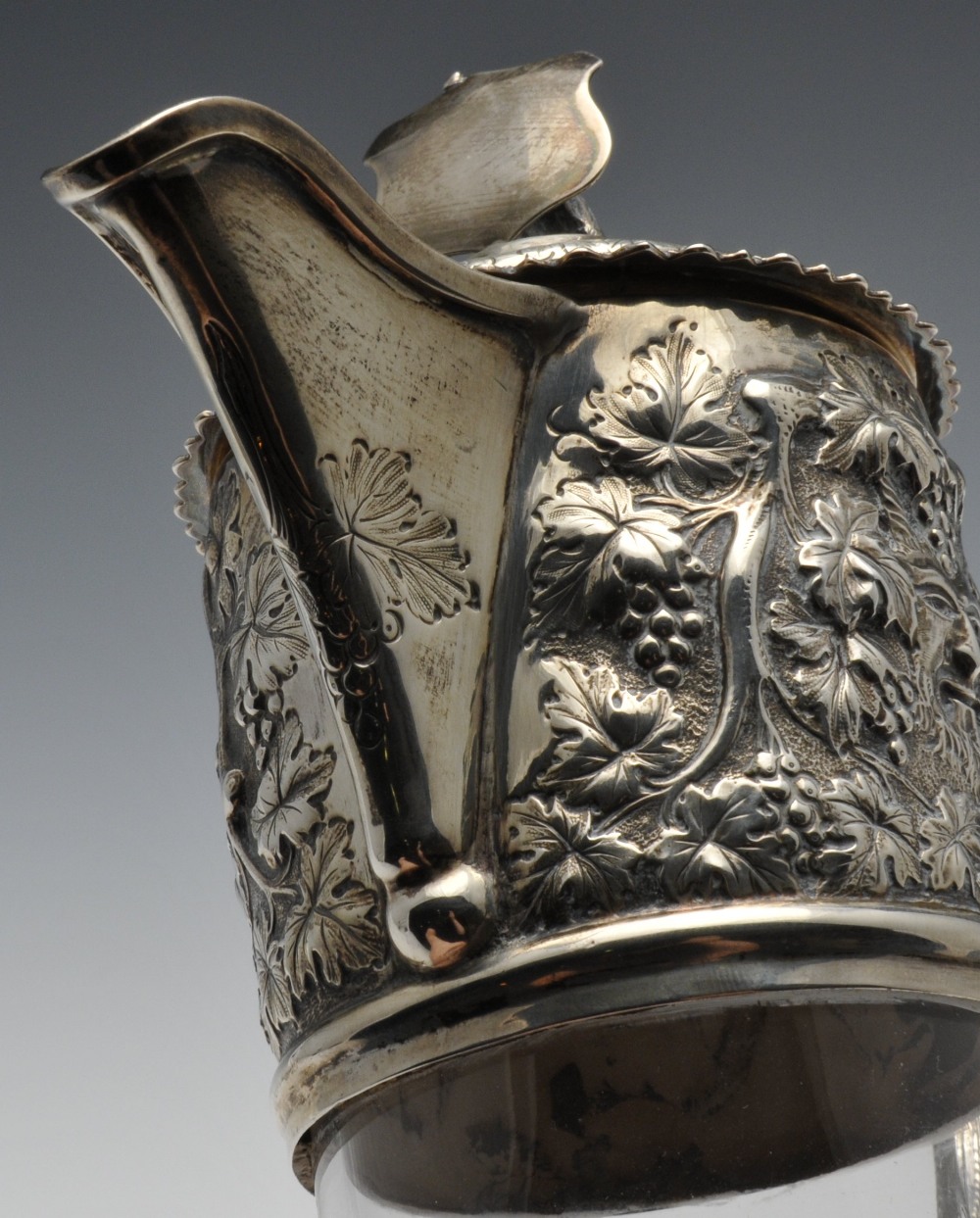 A late Victorian silver mounted claret jug, the Bacchanalian mount having lion and vacant shield - Image 4 of 8