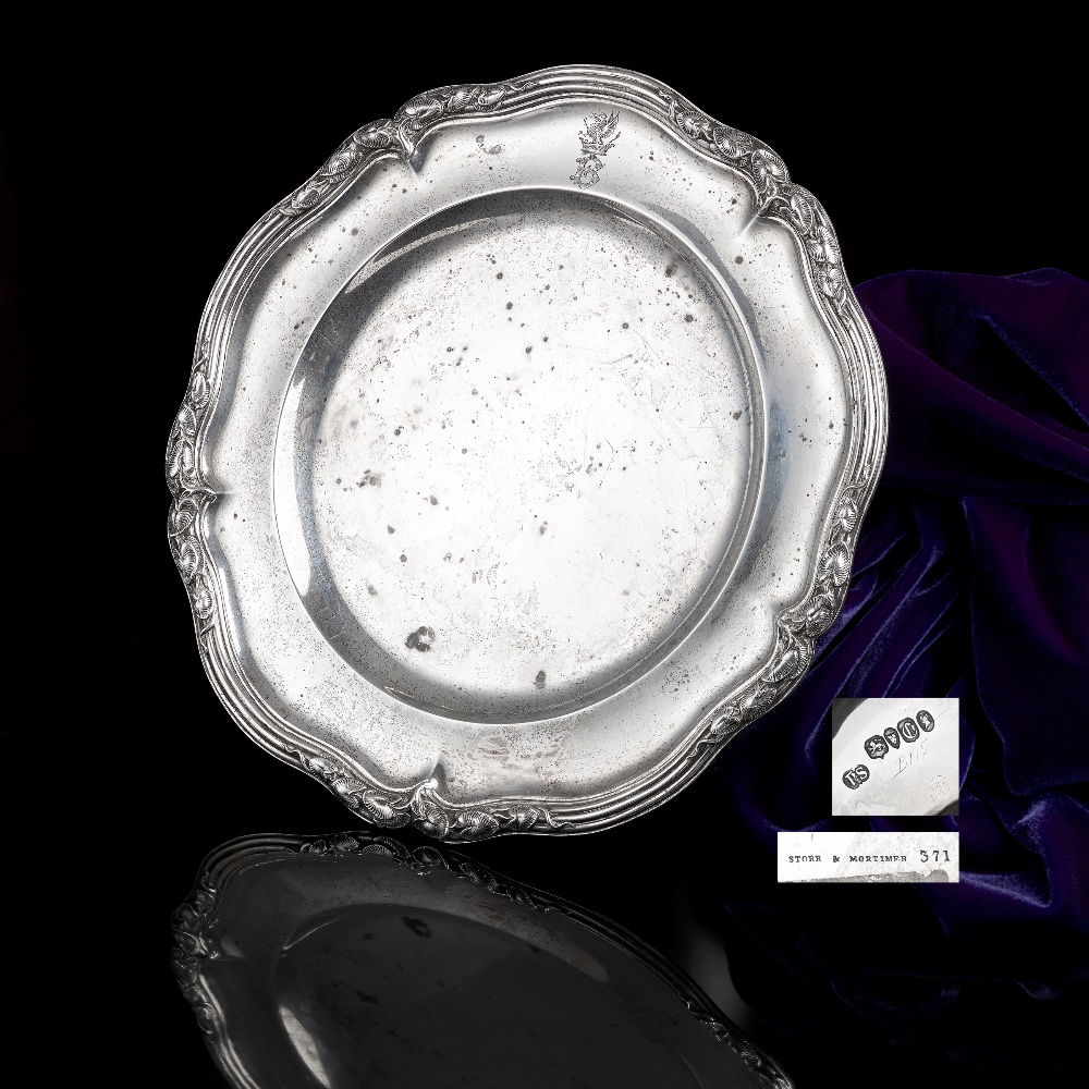 An early Victorian silver plate by Paul Storr, of shaped circular outline with applied decoration of