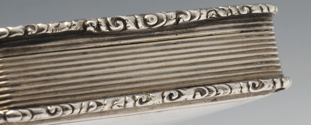 An early Victorian silver snuff box, the rounded rectangular form with floral scroll borders - Image 5 of 6