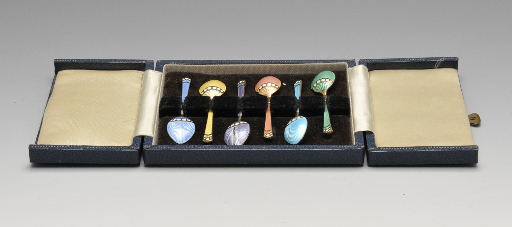A cased set of six 1960's enamelled silver coffee spoons, decorated to the stems and bowls with