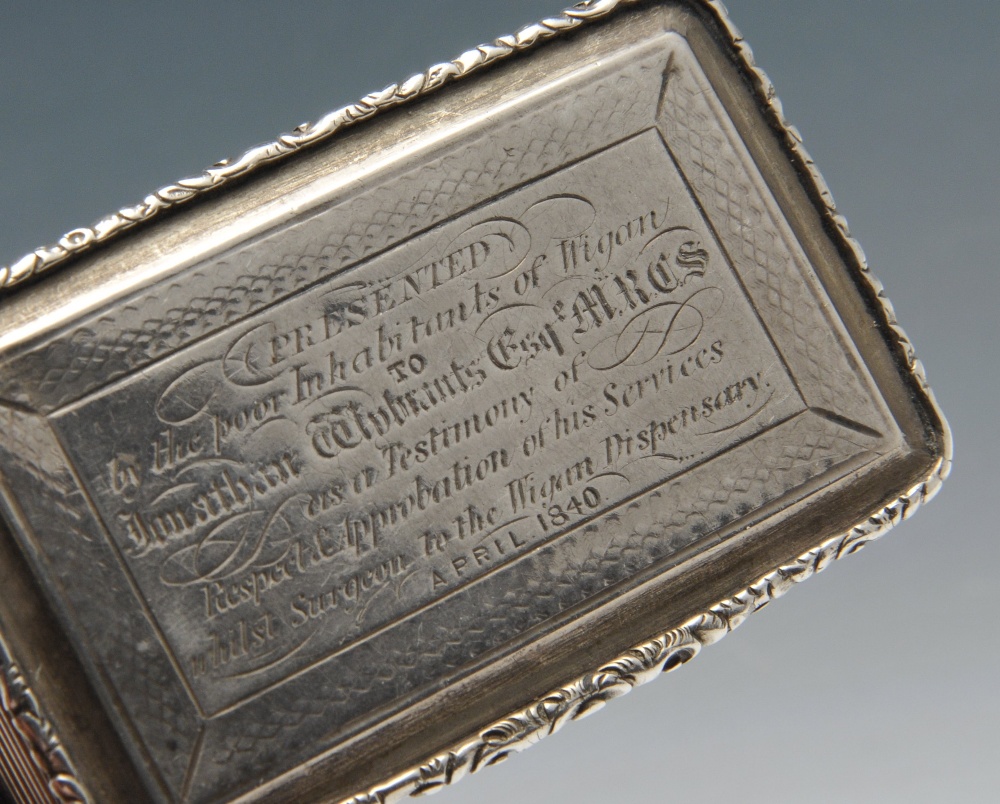 An early Victorian silver snuff box, the rounded rectangular form with floral scroll borders - Image 4 of 6