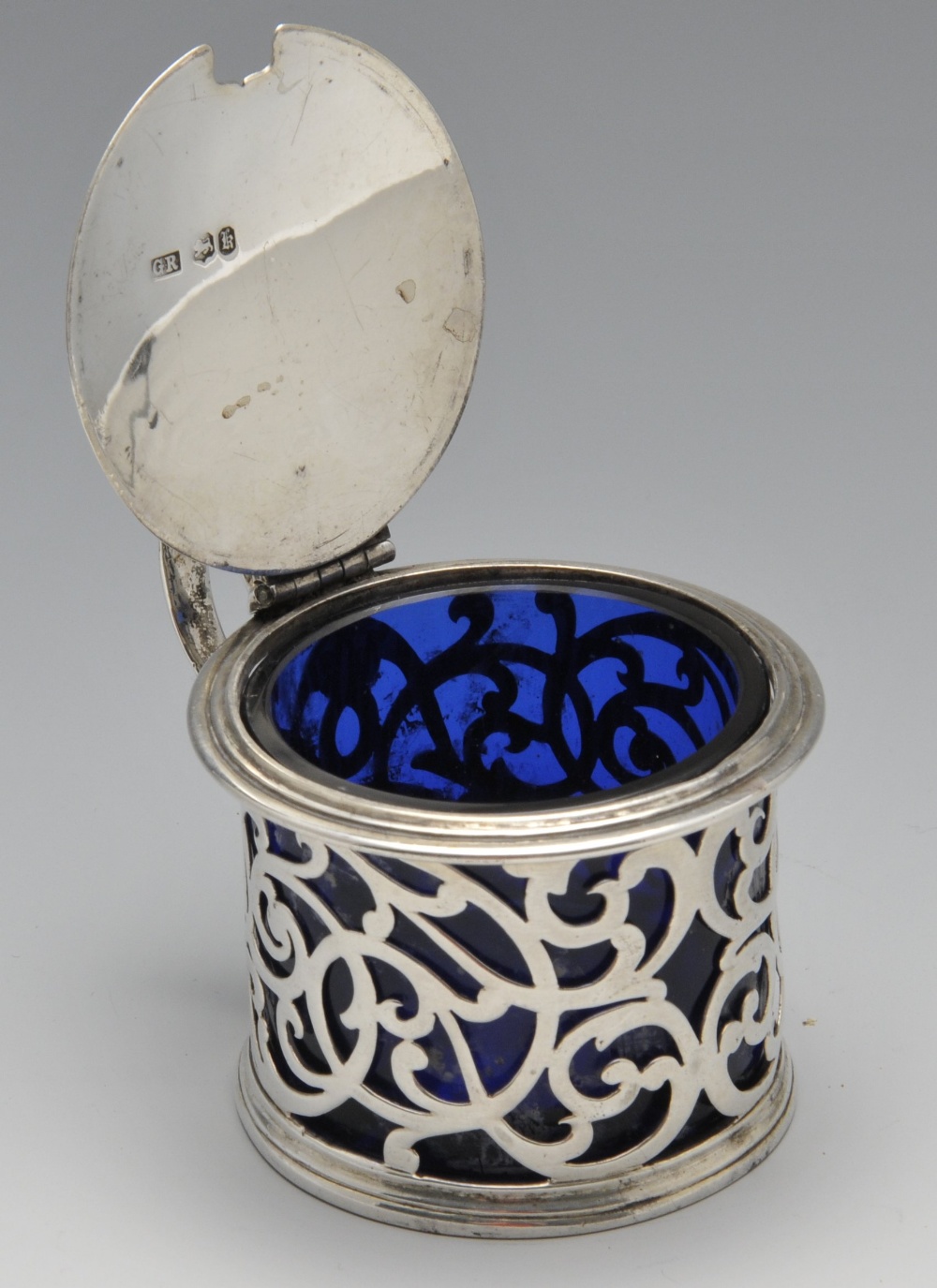 An early Victorian silver mustard pot with blue glass liner, the circular form with foliate scroll - Image 2 of 6