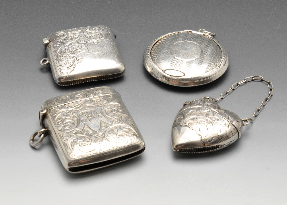 A Victorian silver heart-shaped vesta case partly decorated with scroll engraved, personal name