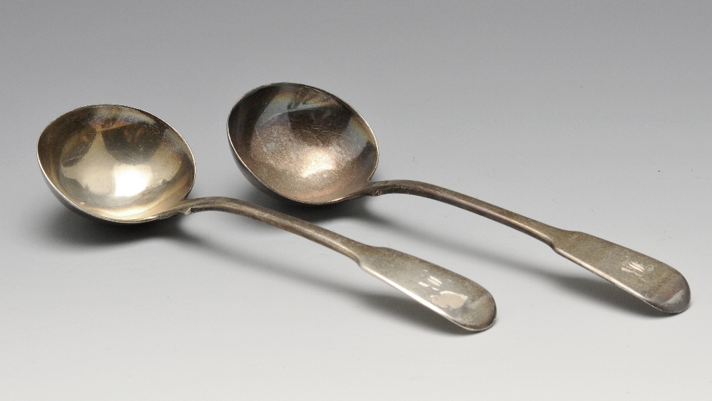 A pair of late George III silver Fiddle pattern sauce ladles, having initialled terminals,