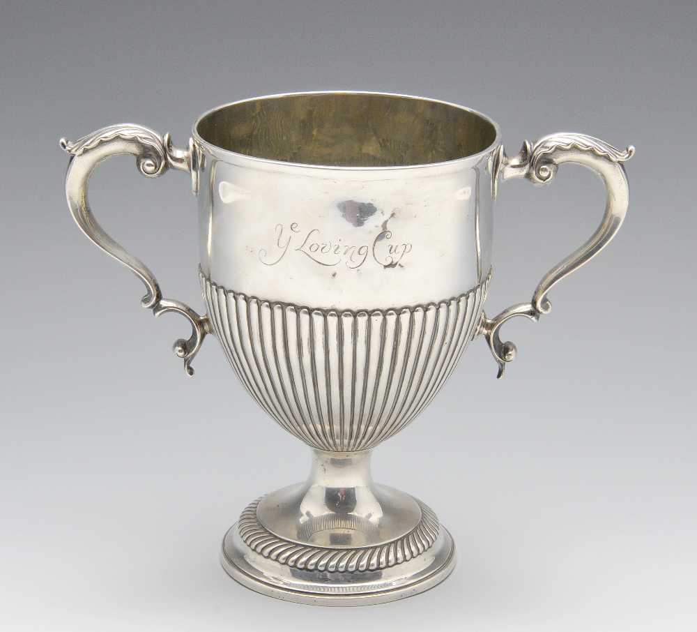 A George III silver twin-handled cup, the classic form partly fluted and engraved 'Ye Loving Cup'