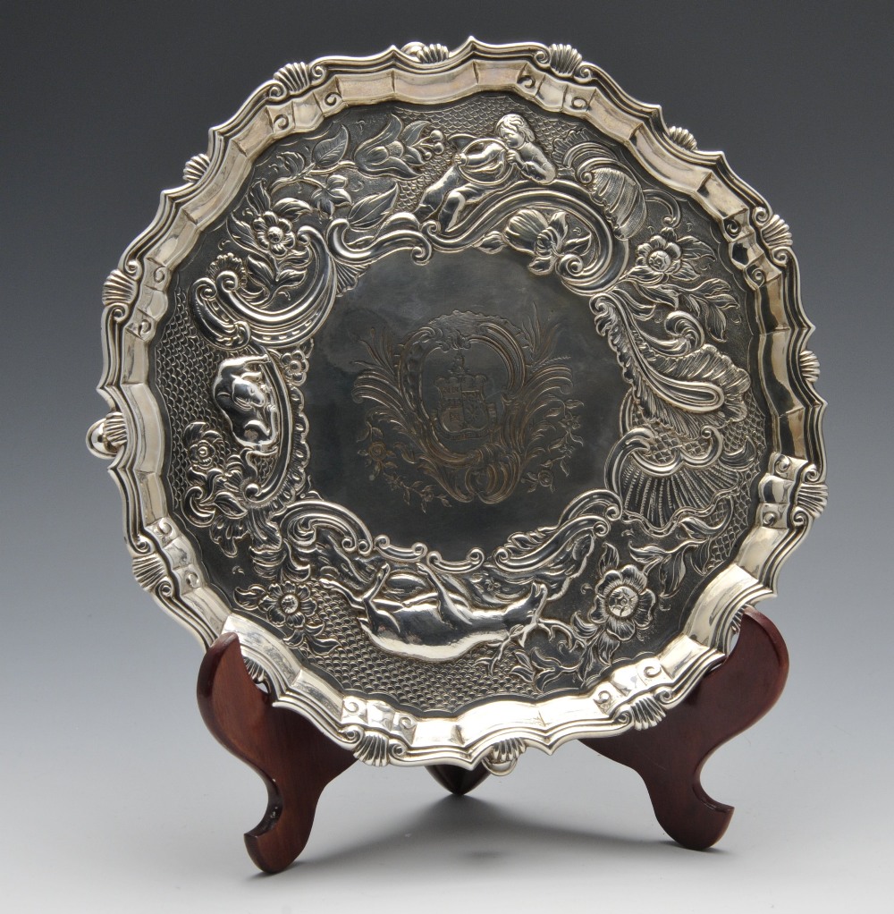 A suite of George II matched salvers, comprising a similar pair and third larger example, each of - Image 2 of 15