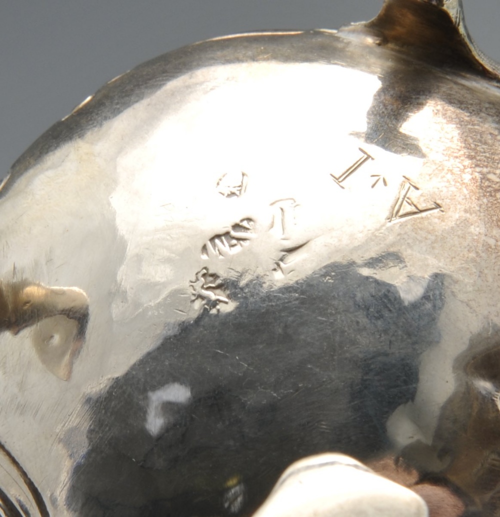 A George II silver cream jug, of globular form having waisted neck and shaped rim, decorated with - Image 2 of 9