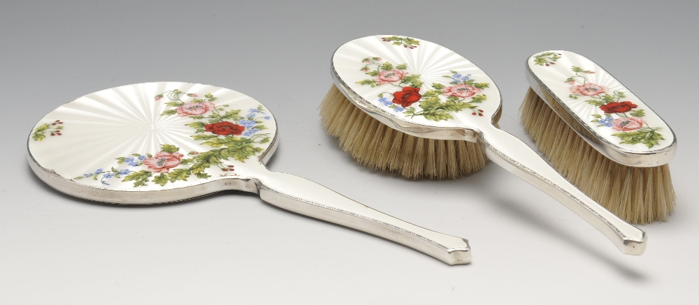 A 1960's cased silver mounted three piece dressing table set, comprising hand mirror hair brush - Image 2 of 9