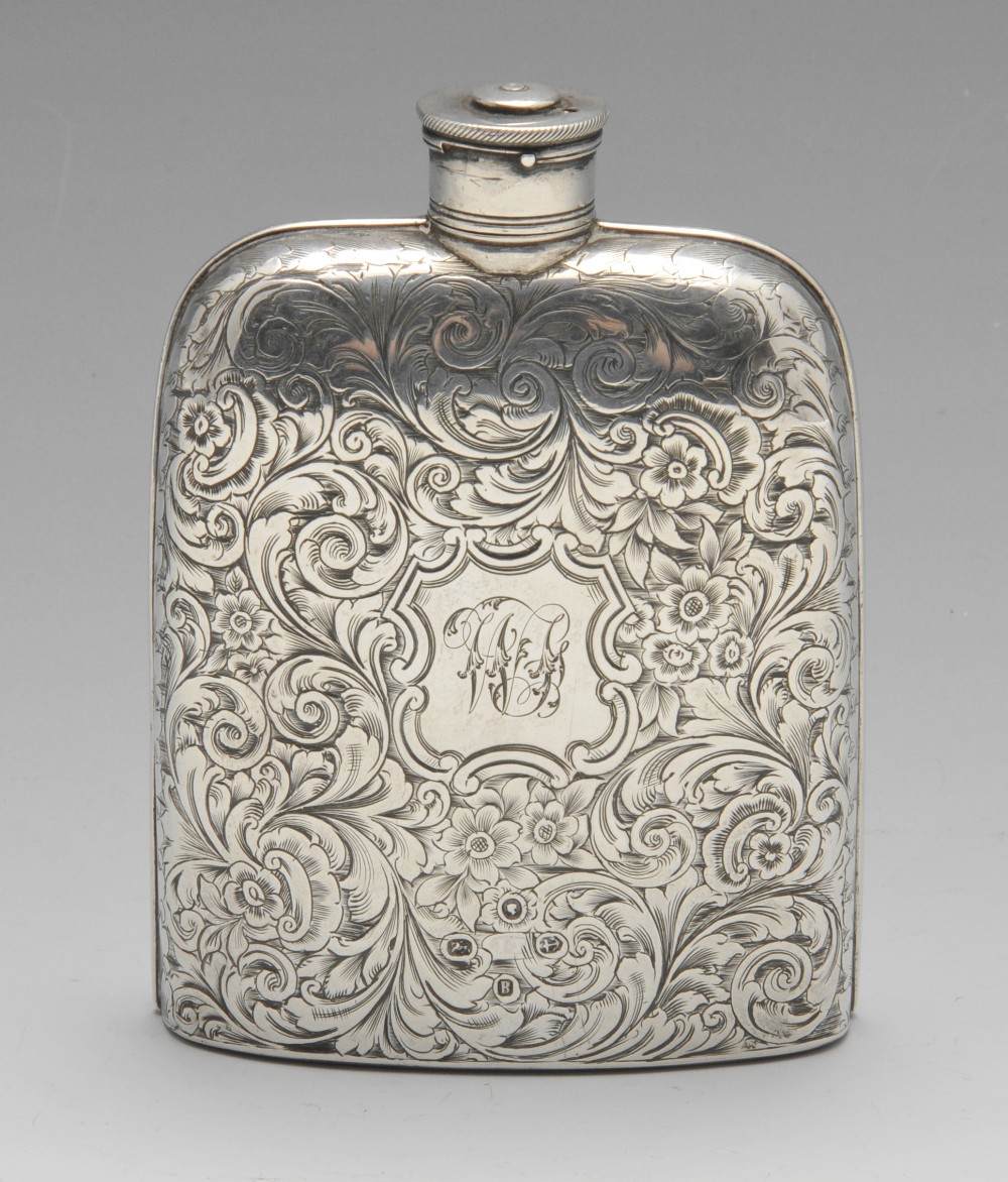 A Victorian silver hip flask, the pocket form with floral scroll engraving and initialled cartouche.