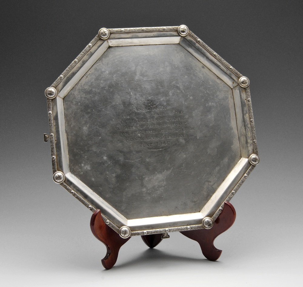 A 1930's silver salver, the octagonal body with central presentation inscription, rising to the