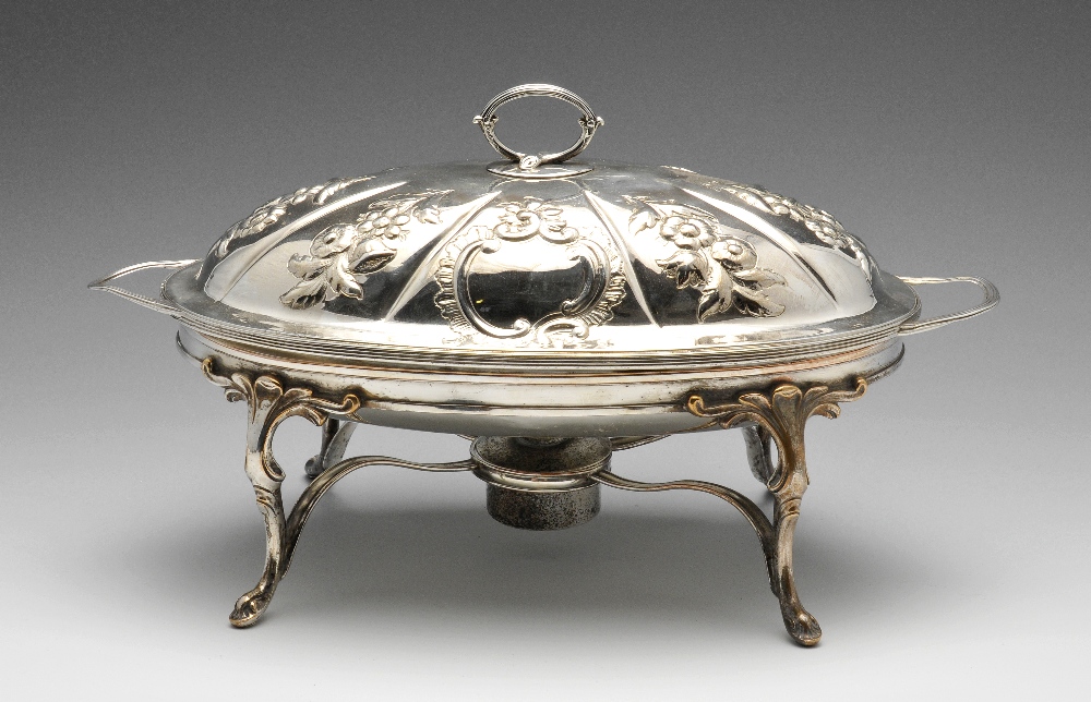 A George III silver entree dish and cover, the oval form with reeded rim and twin handles and