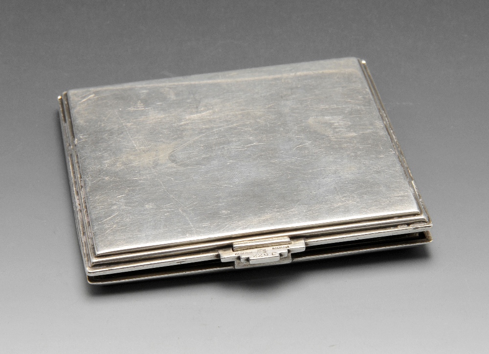 A Danish import Art Deco silver compact, of plain square form having stepped reeded edge and