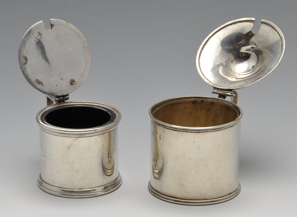 A late Victorian silver mustard pot of plain cylindrical form having beaded rims, a simple scroll - Image 2 of 4