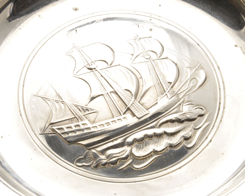 A modern silver Armada dish, the conventional form with central embossed depiction of a ship. - Image 3 of 4