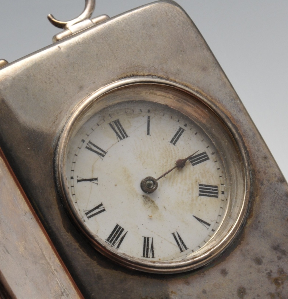 An Edwardian silver carriage clock, the plain oblong form standing on bun feet, circular aperture - Image 3 of 4