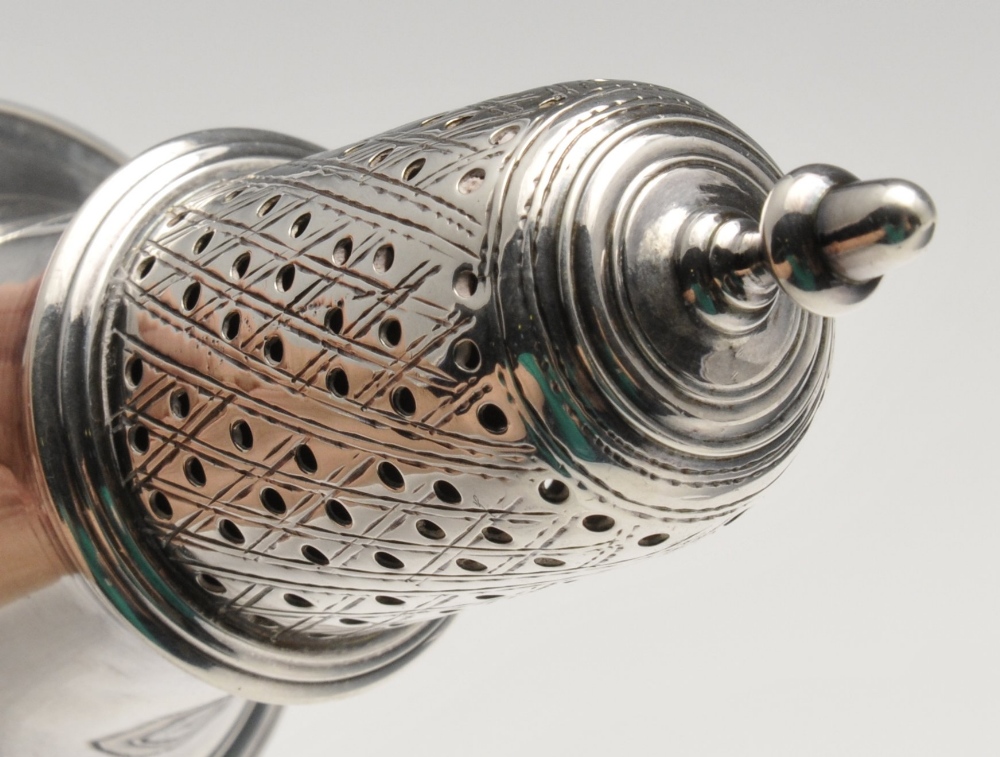 A George III silver caster of baluster form with diaper pierced cover. Hallmarked Hester Bateman, - Image 3 of 3