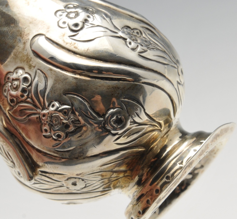 A George III silver cream jug, the bellied form with oblique and floral embossing and sparrow - Image 3 of 12