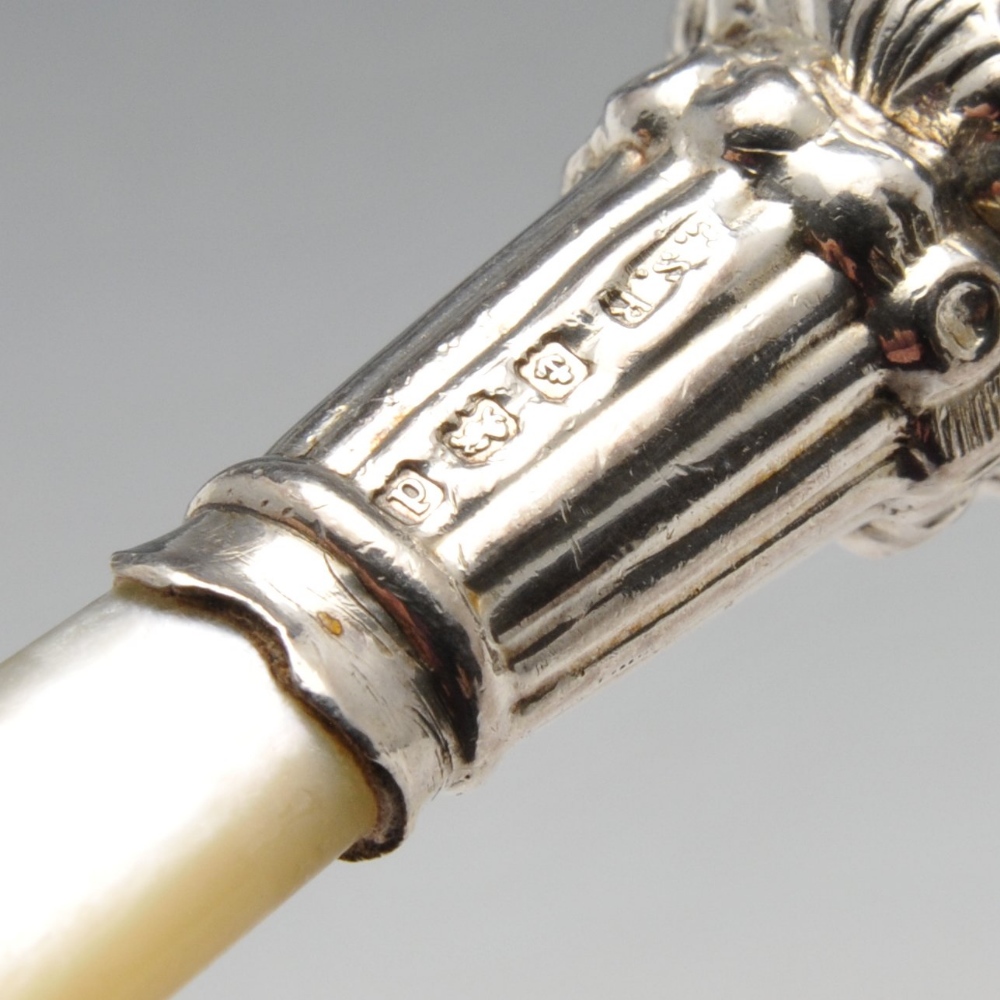 An Edwardian silver mounted rattle, of baluster form with whistle, bell suspensions and mother-of- - Image 2 of 3