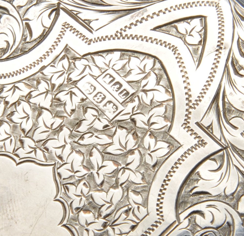 A late Victorian silver aide memoire, finely decorated with engraved foliate scrollwork to the whole - Image 5 of 5