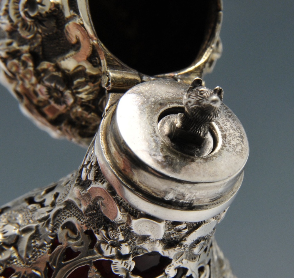 A French scent bottle, the cranberry glass body of tapered form and overlaid with scroll open-work - Image 6 of 6