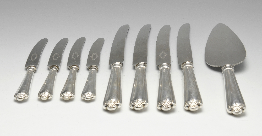 A selection of modern silver handled knives with scrolled terminals, comprising twelve each of large