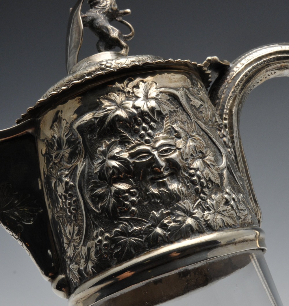 A late Victorian silver mounted claret jug, the Bacchanalian mount having lion and vacant shield - Image 3 of 8