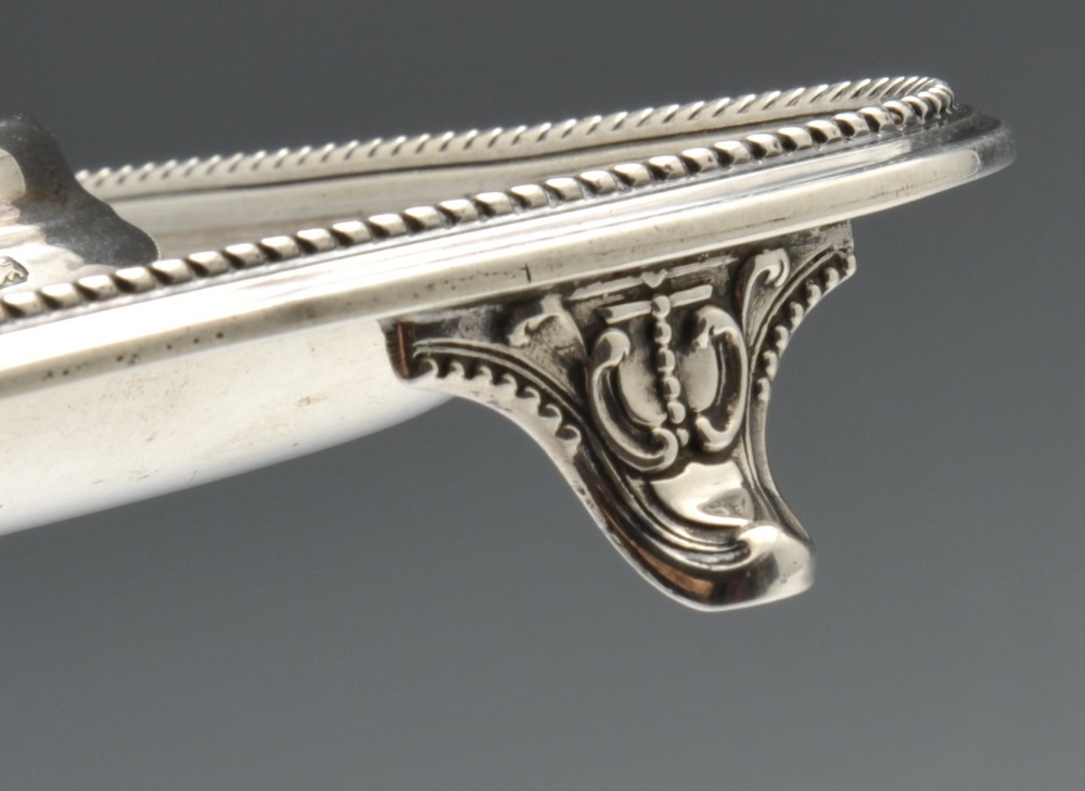 A late Victorian silver inkstand of rounded rectangular form with beaded rim and raised on four - Image 6 of 11