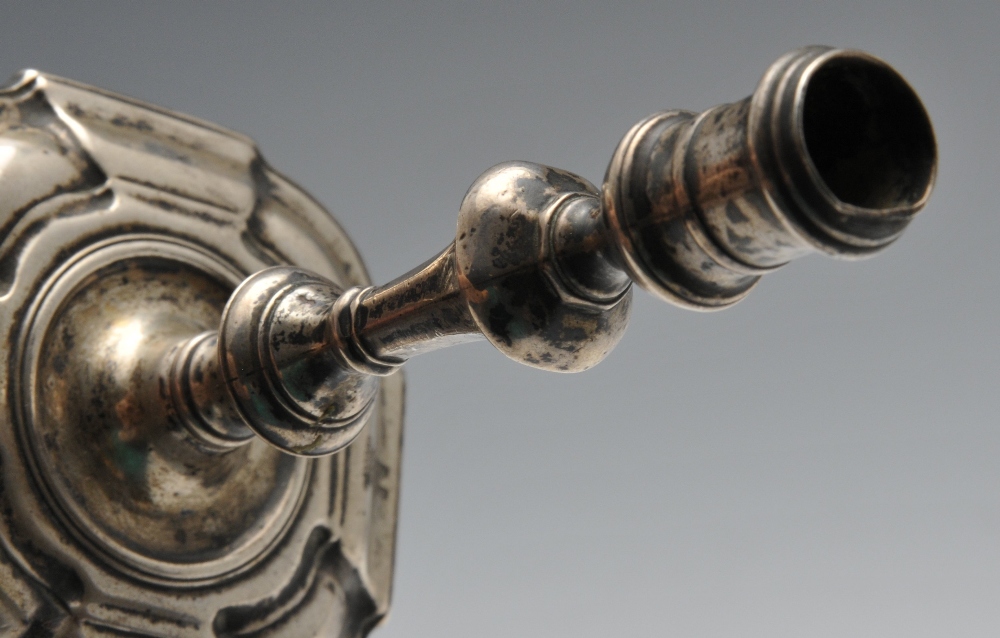 A George II silver taperstick, the knopped baluster stem raised on a crested octagonal fluted - Image 3 of 3