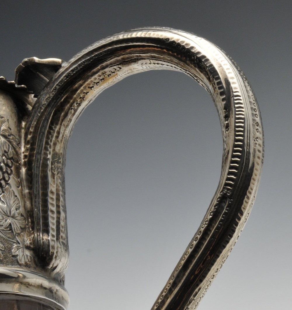 A late Victorian silver mounted claret jug, the Bacchanalian mount having lion and vacant shield - Image 7 of 8