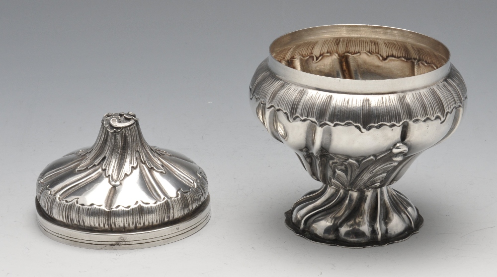 A small continental bowl and cover of wrythen moulded bulbous form to a footed base, embossed with - Image 4 of 4