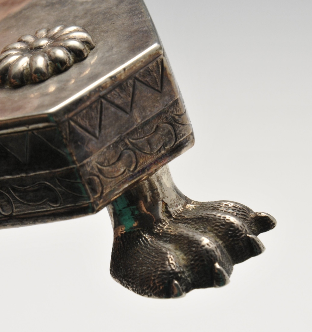 A South American candlestick of tri-form, florally embellished base raised on three paw feet and - Image 4 of 4