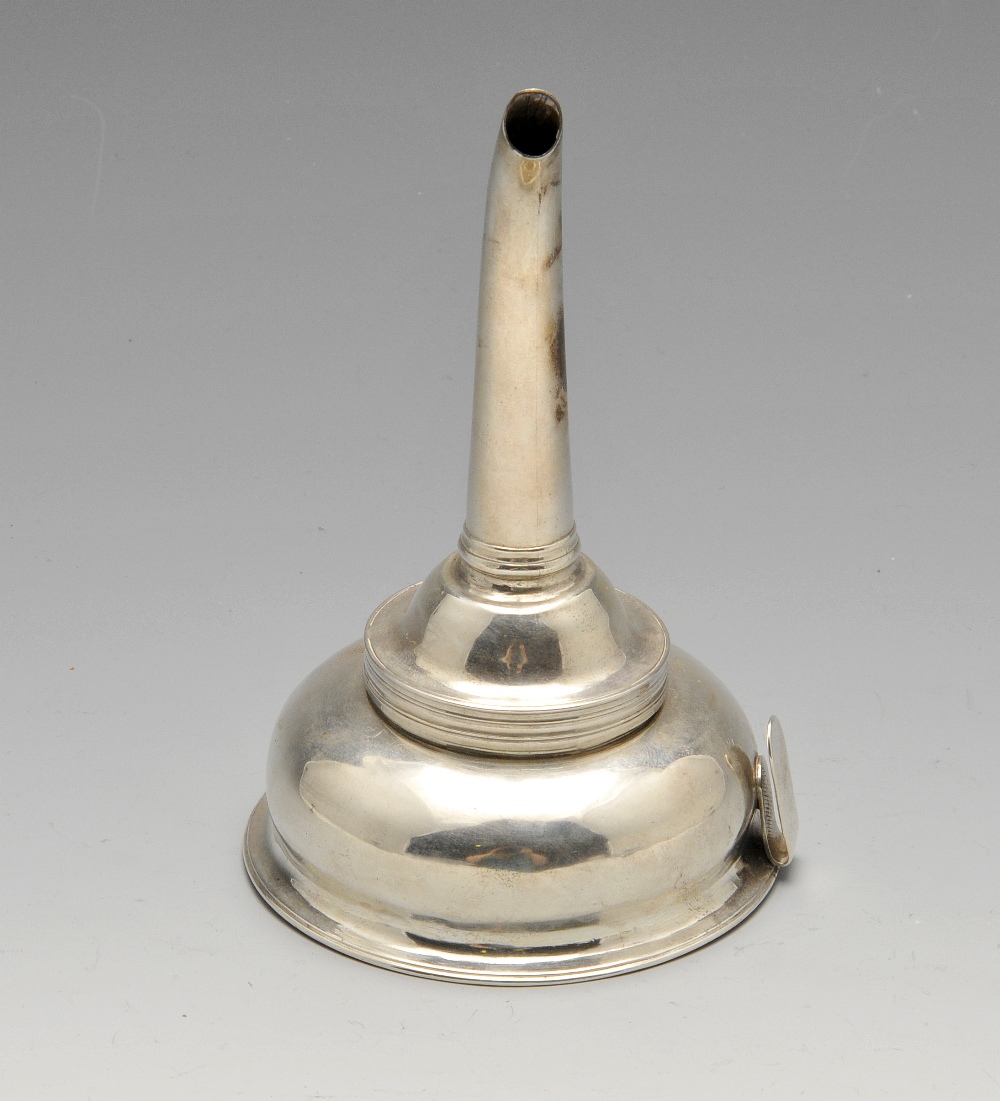 A George III silver wine funnel of conventional form with simple drill-pierced sieve. Hallmarked