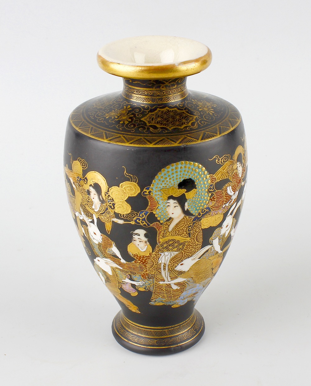 An unusual Japanese satsuma vase, of tapering shouldered form with short flared neck, finely