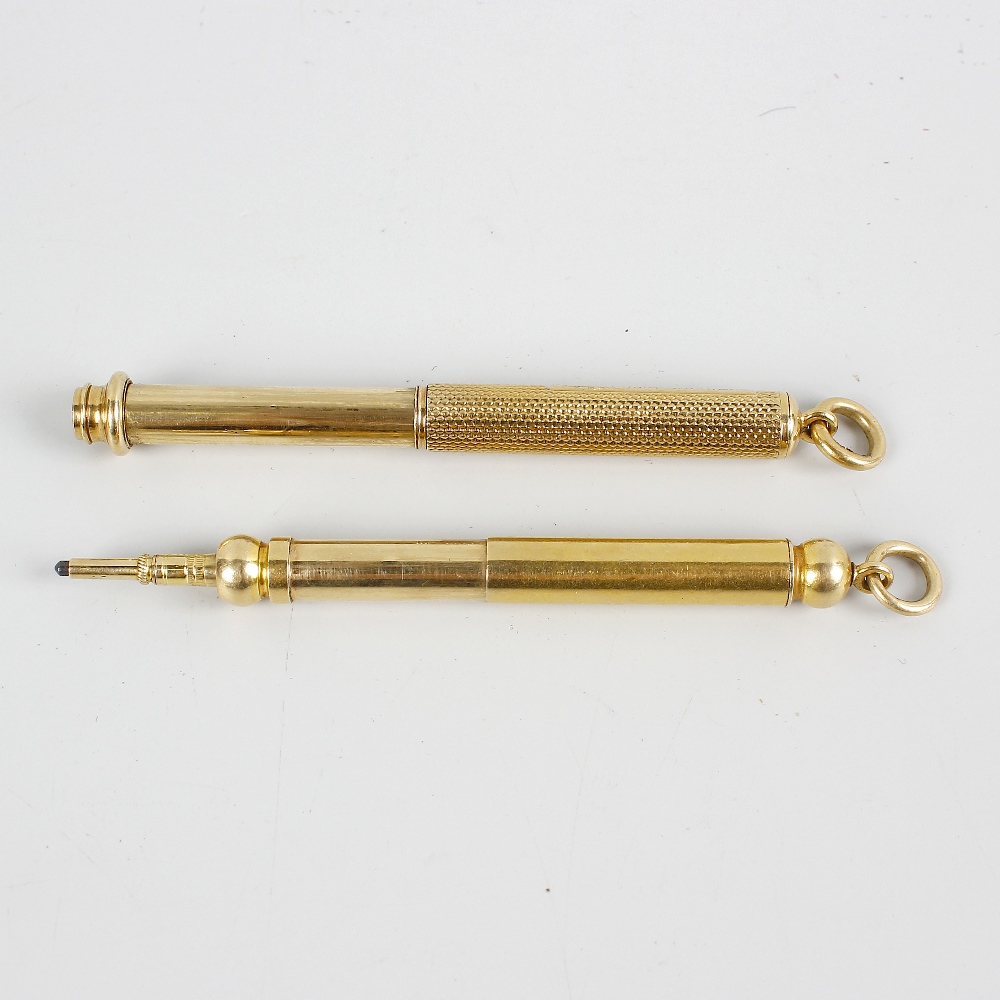 Two Sampson Mordan & Co. yellow metal retractable pencils. The first of plain telescopic form with